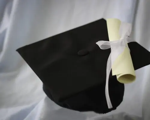 graduation cap and diploma