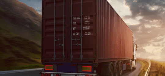 Semi-truck driving on a highway at sunset, representing how insurance companies handle Colorado Springs truck accident claims, including settlement tactics, evidence evaluation, and strategies for protecting claim value after a collision.