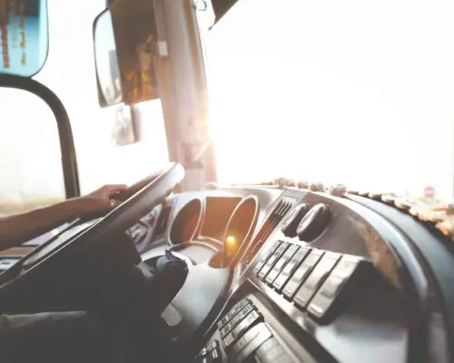 Semi-truck dashboard from passenger's point of view