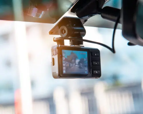 Car video camera attached to the windshield to record driving and prevent danger from driving