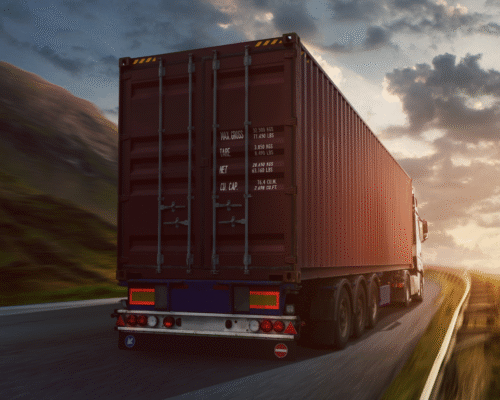 Semi-truck driving on a highway at sunset, representing how insurance companies handle Colorado Springs truck accident claims, including settlement tactics, evidence evaluation, and strategies for protecting claim value after a collision.