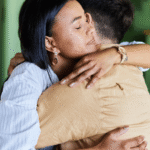 Two people hugging to console each other